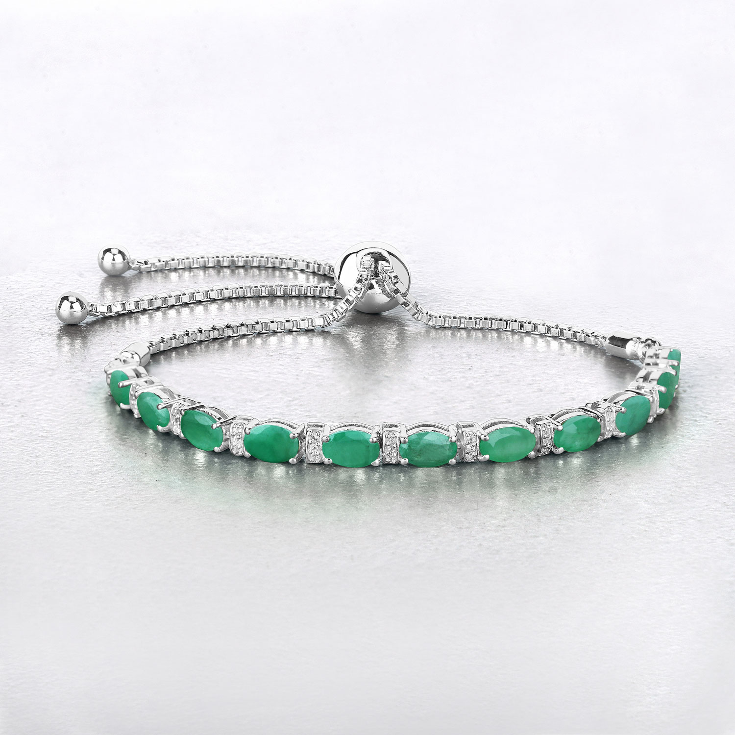 4.98 Carat Genuine Emerald and White Topaz .925 Sterling Silver Bracelet
