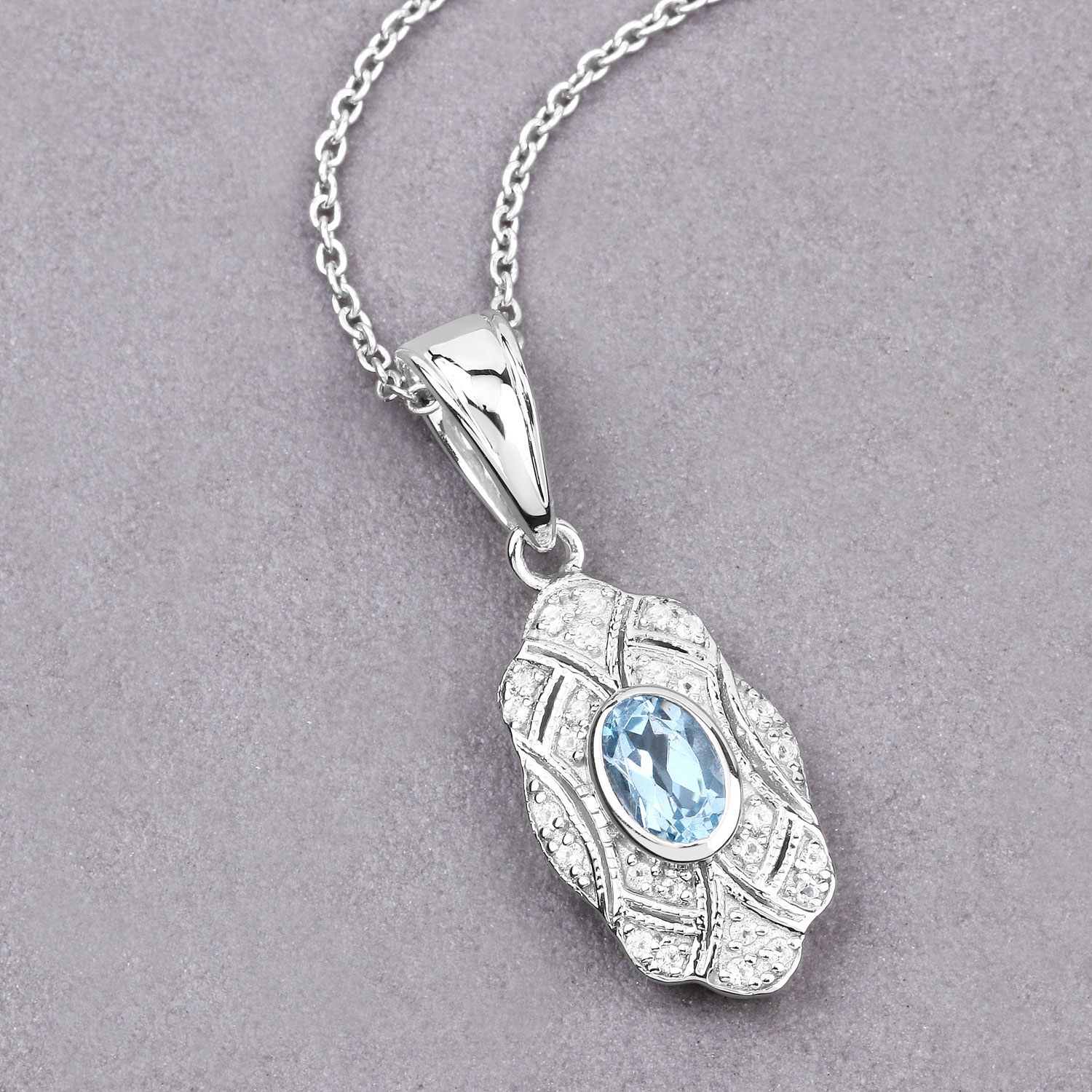 0.63 Carat Genuine Blue Topaz and White Topaz .925 Sterling Silver Pendant