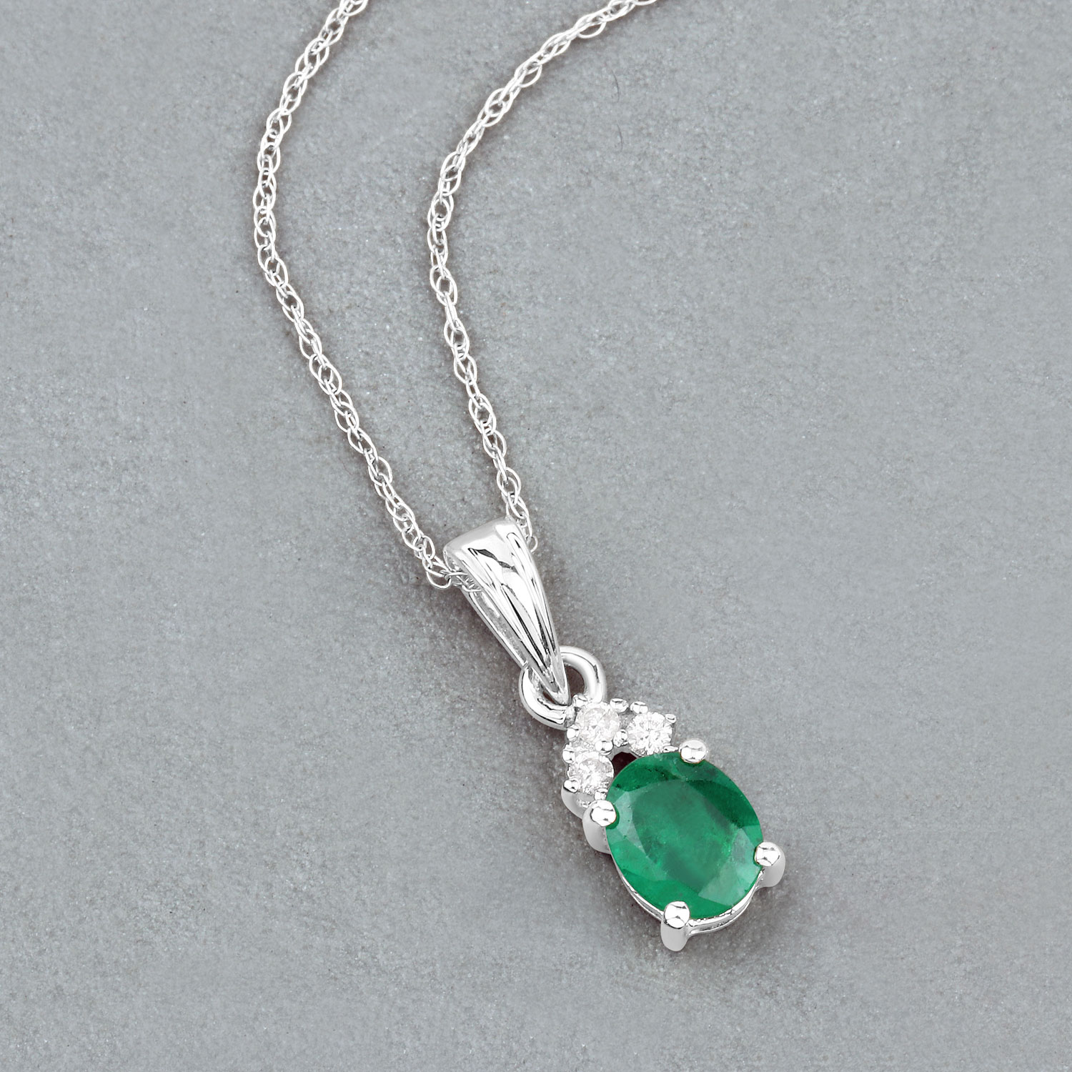 0.64 Carat Genuine Zambian Emerald and White Diamond 10K White Gold Pendant