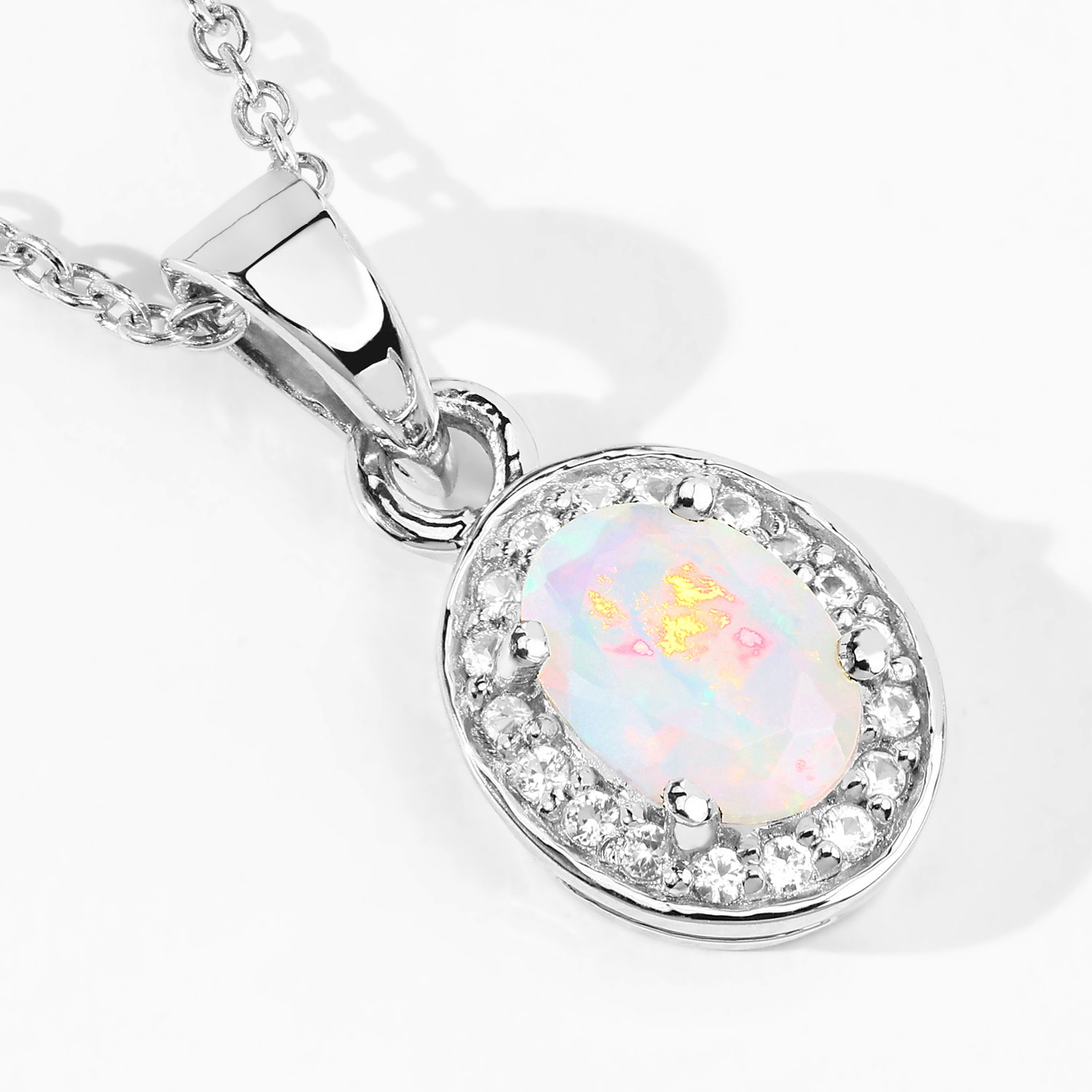 0.46 Carat Genuine Ethiopian Opal and Created White Sapphire .925 Sterling Silver Pendant