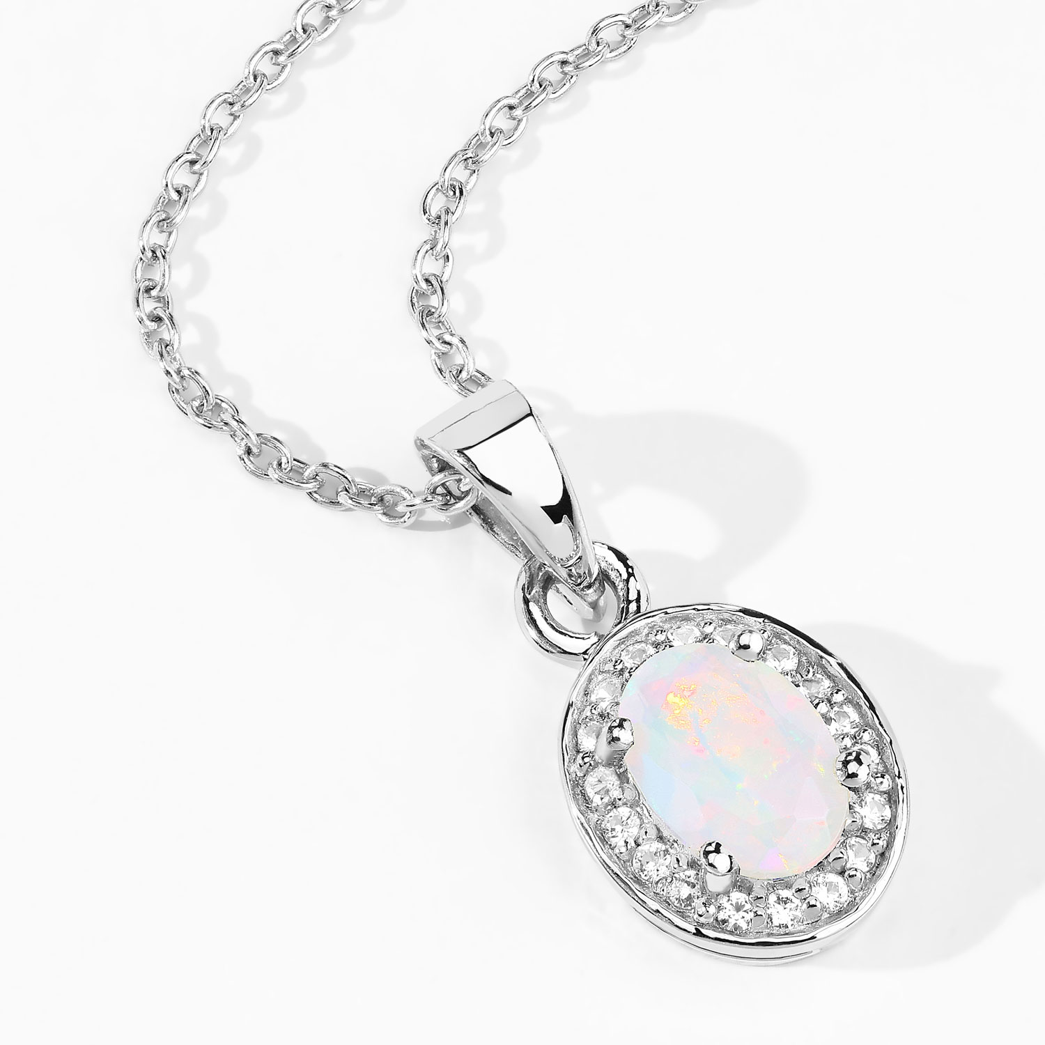 0.46 Carat Genuine Ethiopian Opal and Created White Sapphire .925 Sterling Silver Pendant