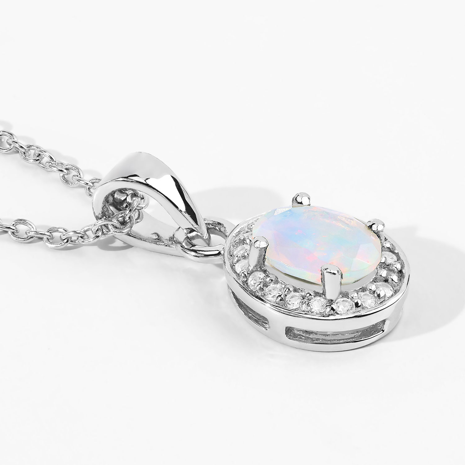 0.46 Carat Genuine Ethiopian Opal and Created White Sapphire .925 Sterling Silver Pendant