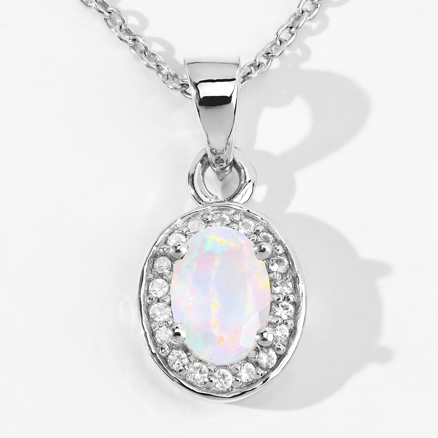 0.46 Carat Genuine Ethiopian Opal and Created White Sapphire .925 Sterling Silver Pendant