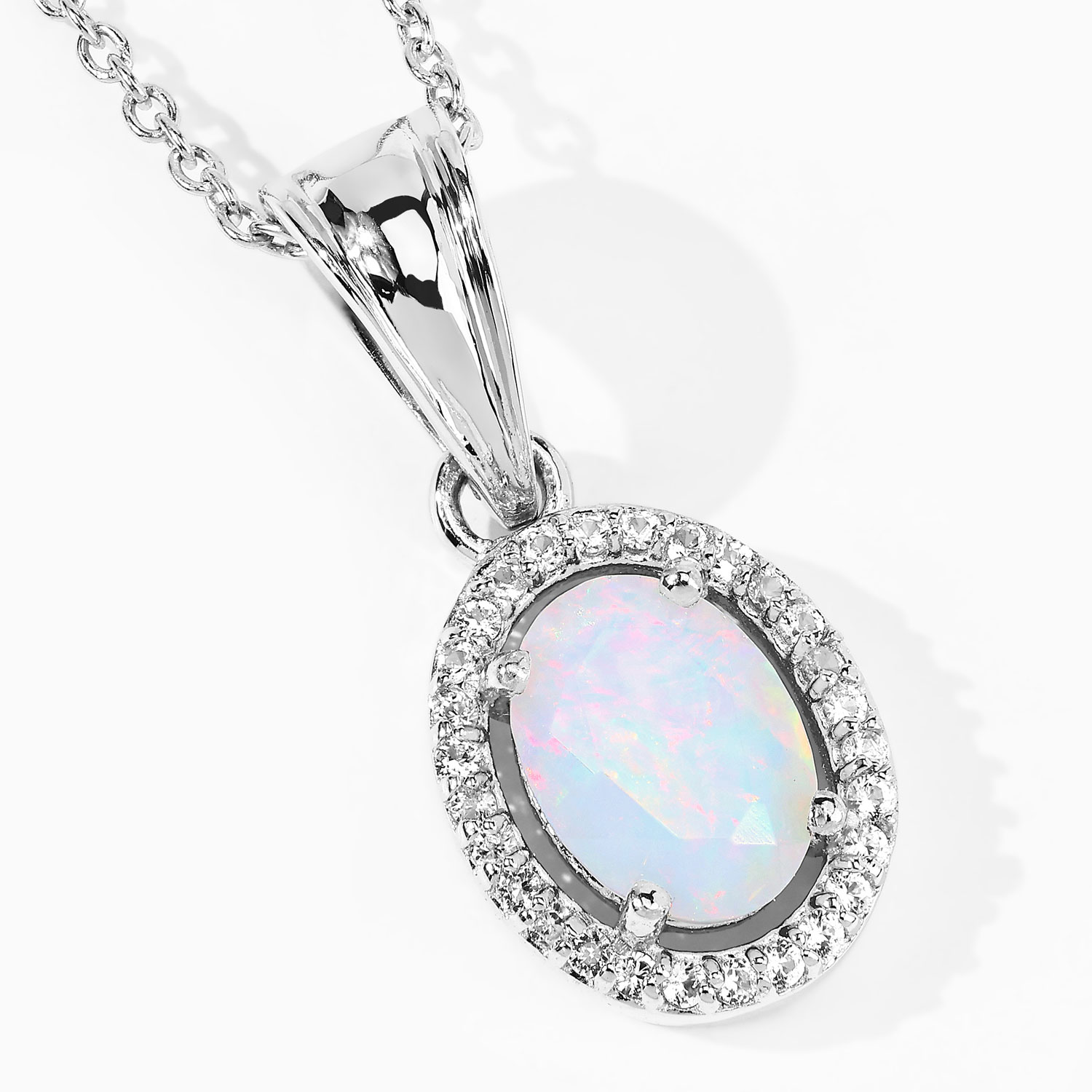 0.80 Carat Genuine Ethiopian Opal and Created White Sapphire .925 Sterling Silver Pendant
