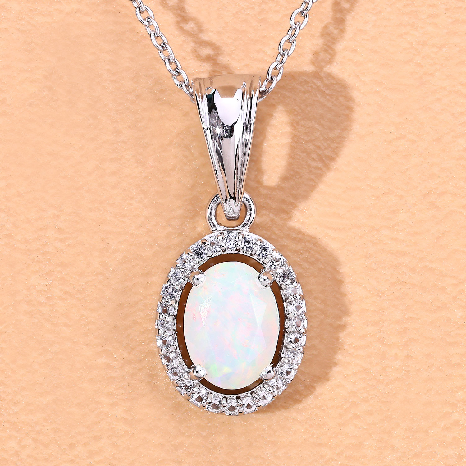 0.80 Carat Genuine Ethiopian Opal and Created White Sapphire .925 Sterling Silver Pendant