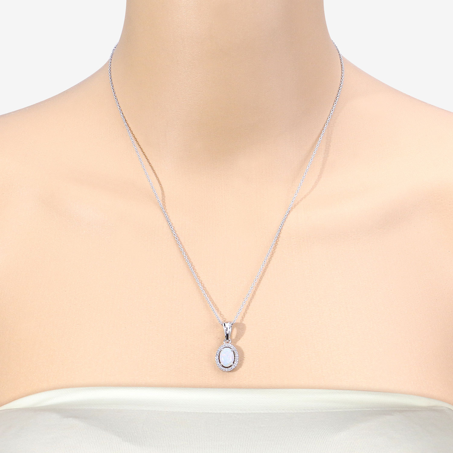 0.80 Carat Genuine Ethiopian Opal and Created White Sapphire .925 Sterling Silver Pendant