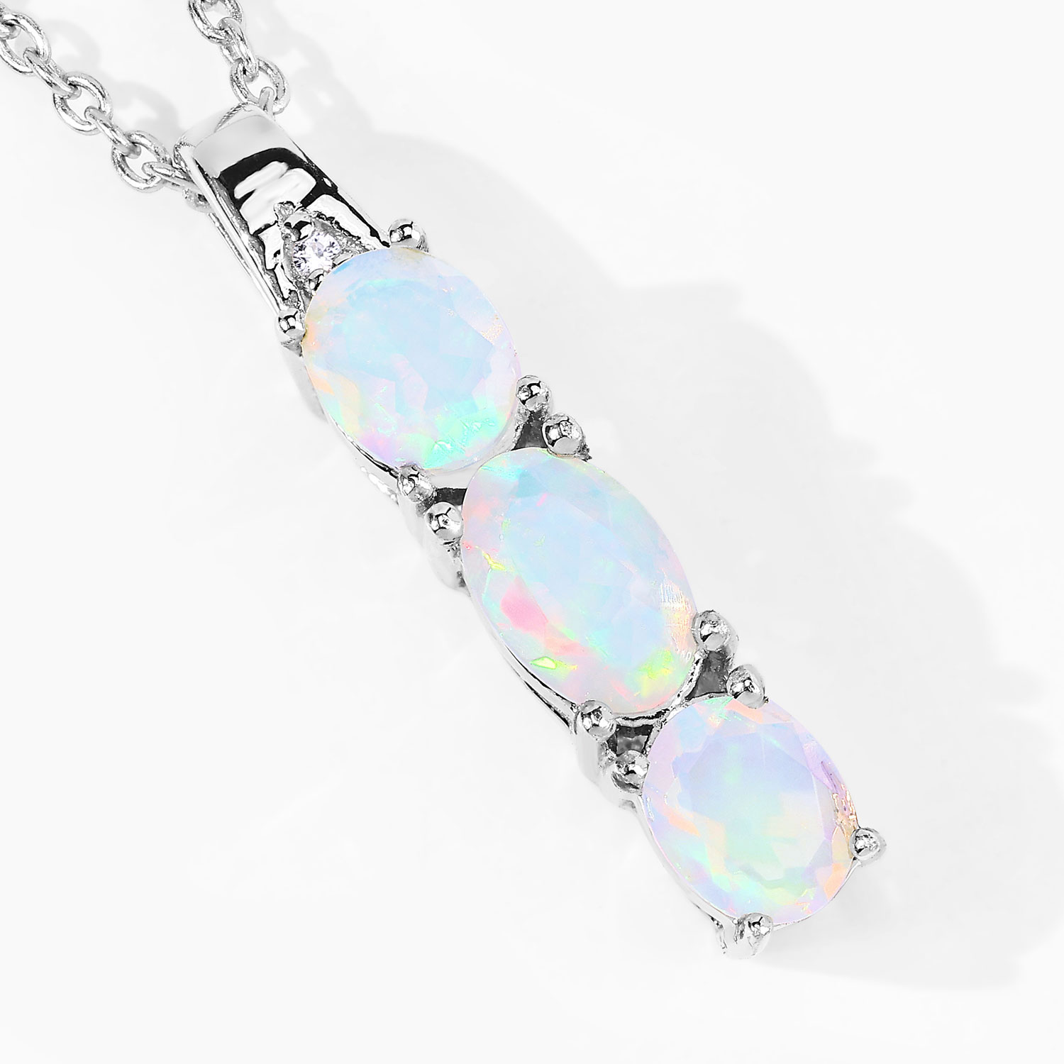 0.69 Carat Genuine Ethiopian Opal and Created White Sapphire .925 Sterling Silver Pendant