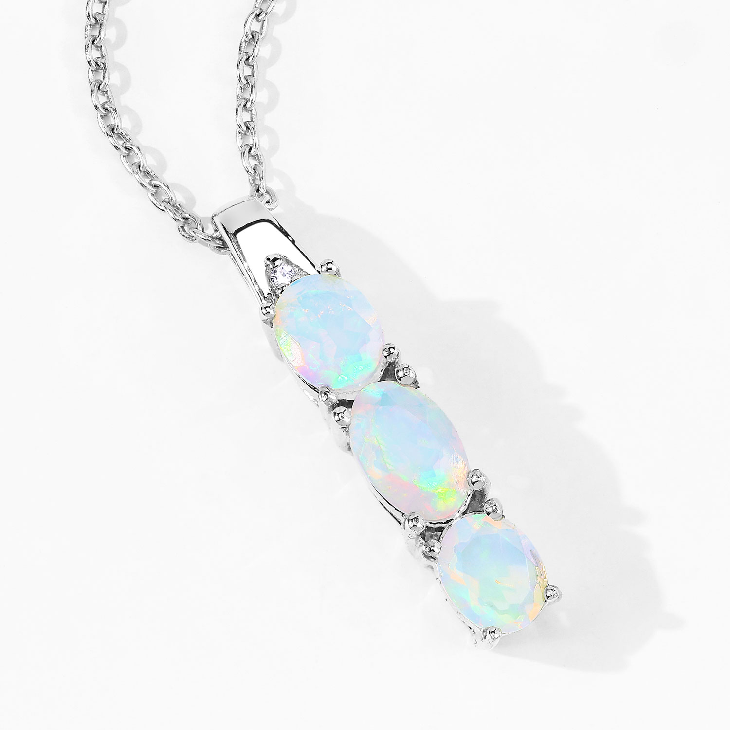 0.69 Carat Genuine Ethiopian Opal and Created White Sapphire .925 Sterling Silver Pendant