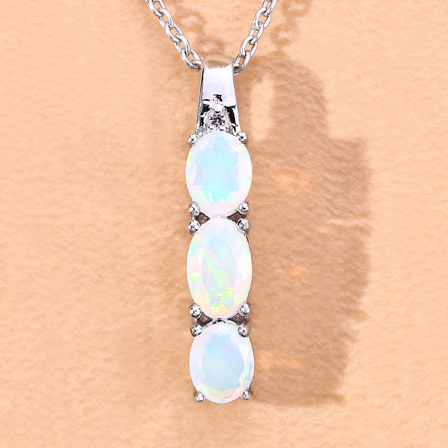 0.69 Carat Genuine Ethiopian Opal and Created White Sapphire .925 Sterling Silver Pendant