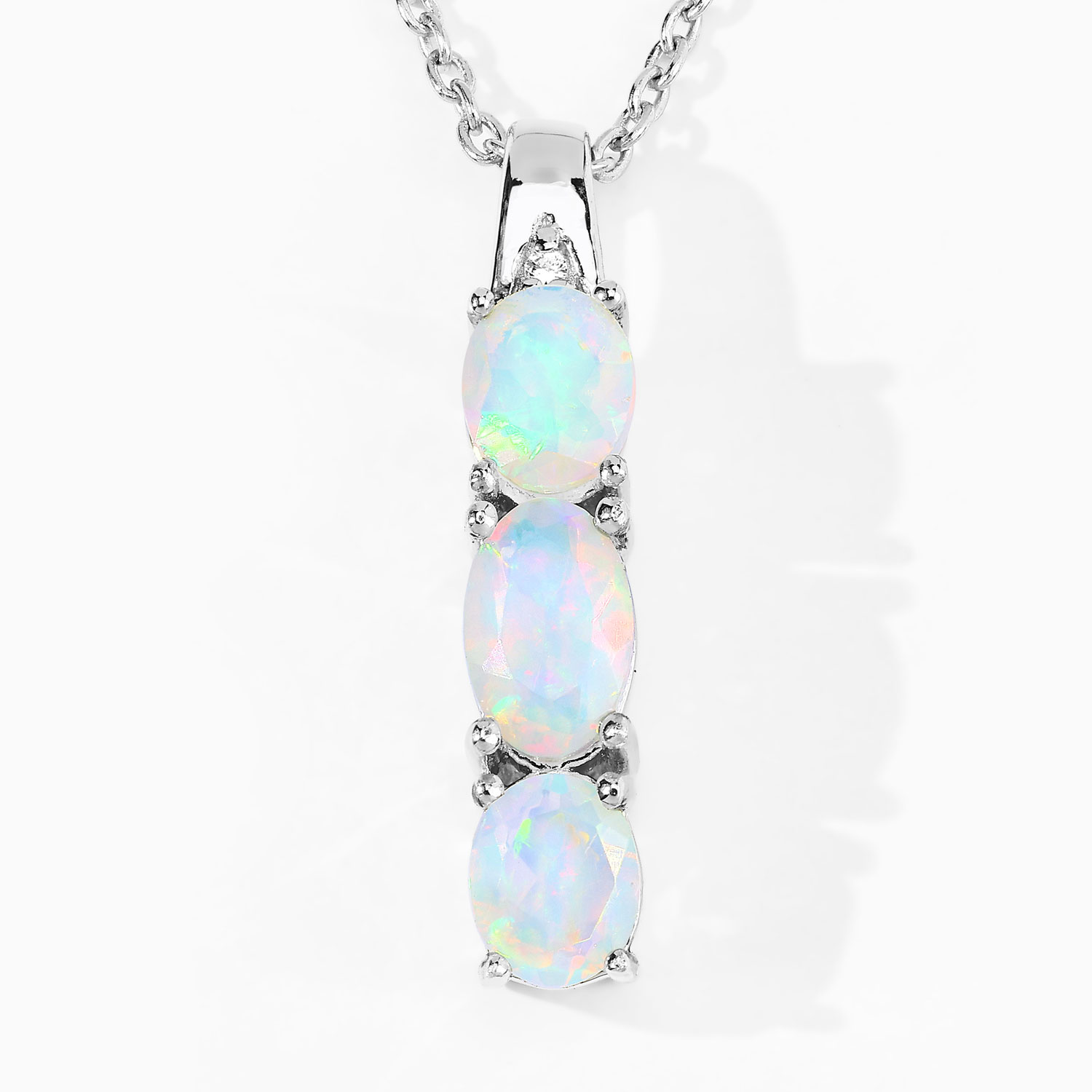 0.69 Carat Genuine Ethiopian Opal and Created White Sapphire .925 Sterling Silver Pendant