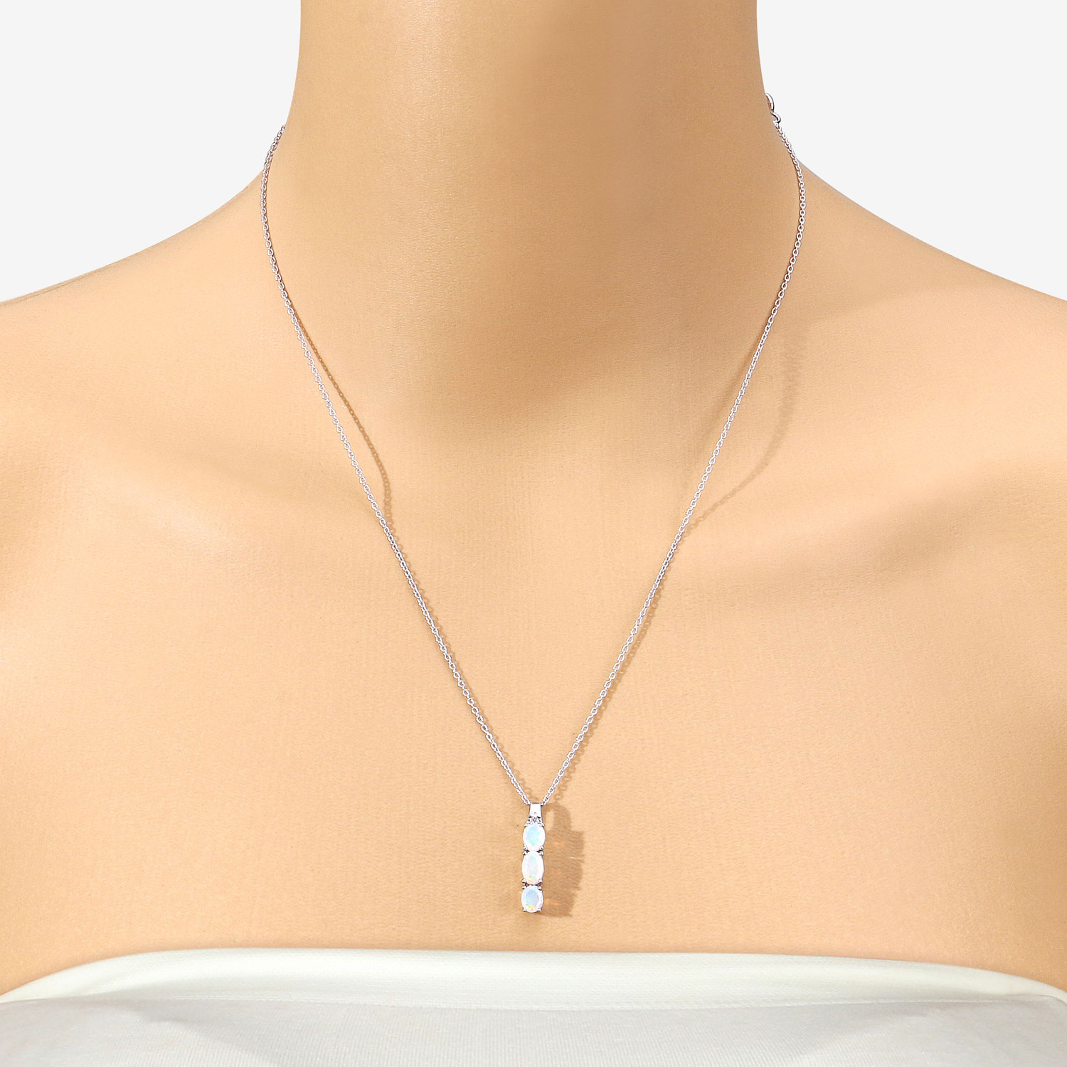 0.69 Carat Genuine Ethiopian Opal and Created White Sapphire .925 Sterling Silver Pendant