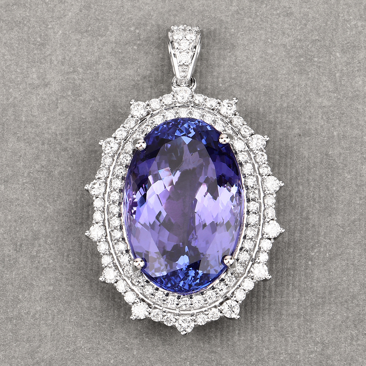 28.39 Carat Genuine Tanzanite and White Diamond 18K White Gold Pendant
