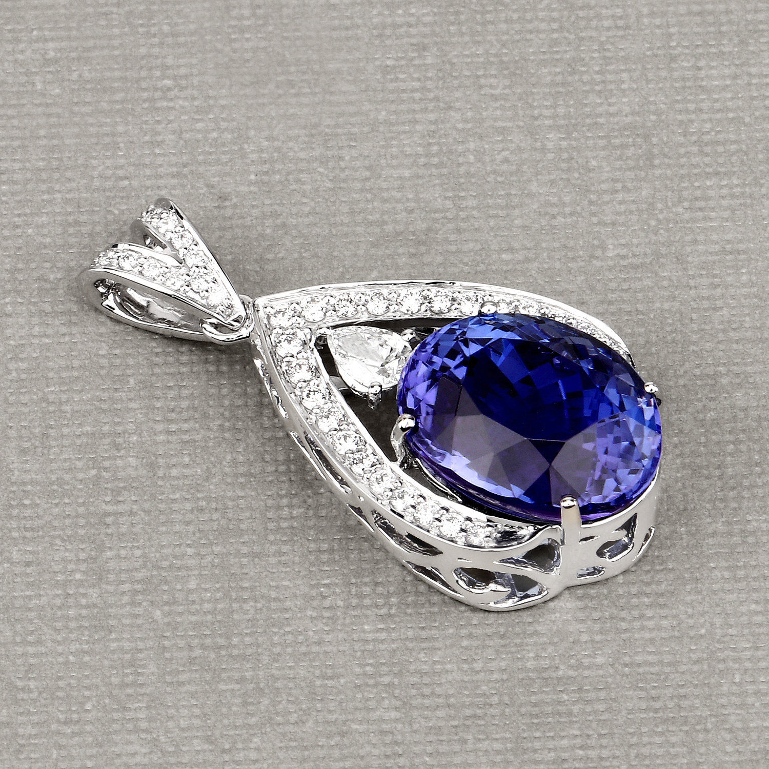12.22 Carat Genuine Tanzanite and White Diamond 18K White Gold Pendant