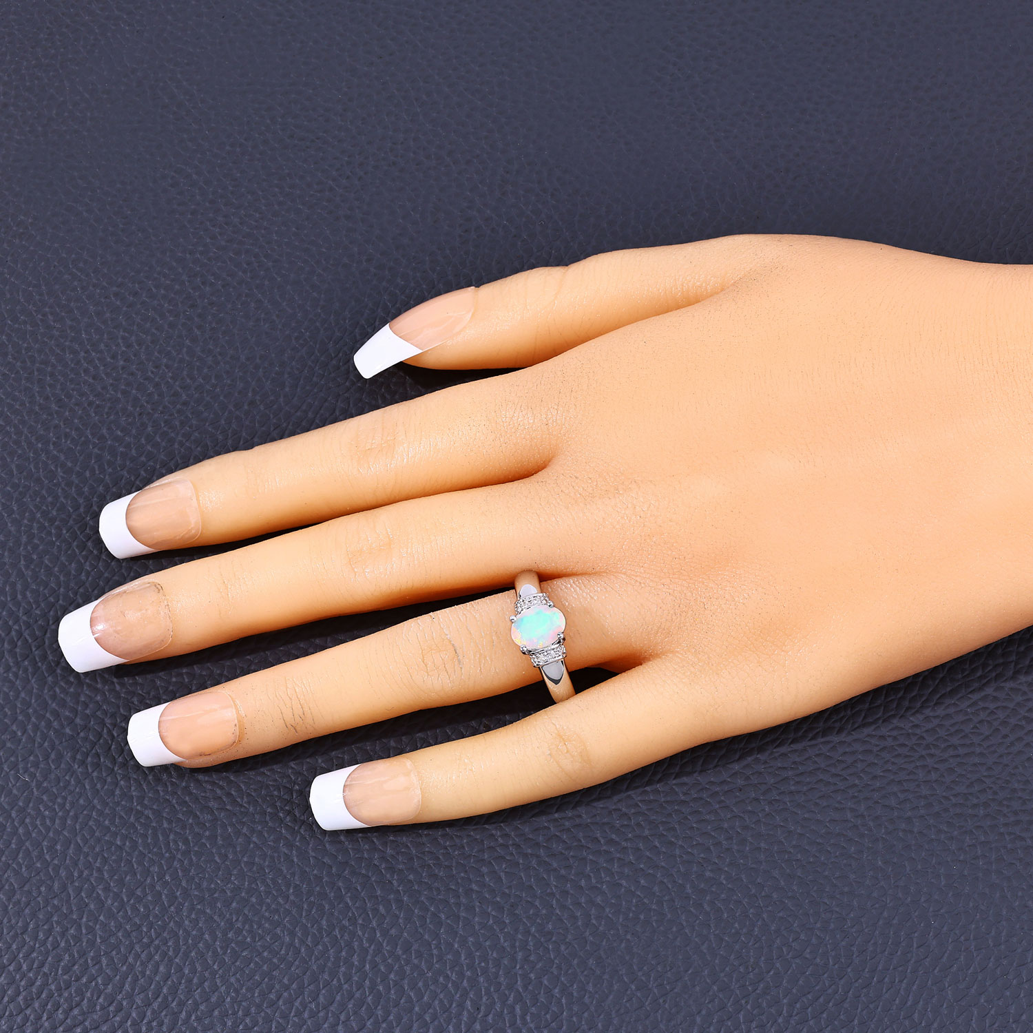 0.69 Carat Genuine Ethiopian Opal and Created White Sapphire .925 Sterling Silver Ring