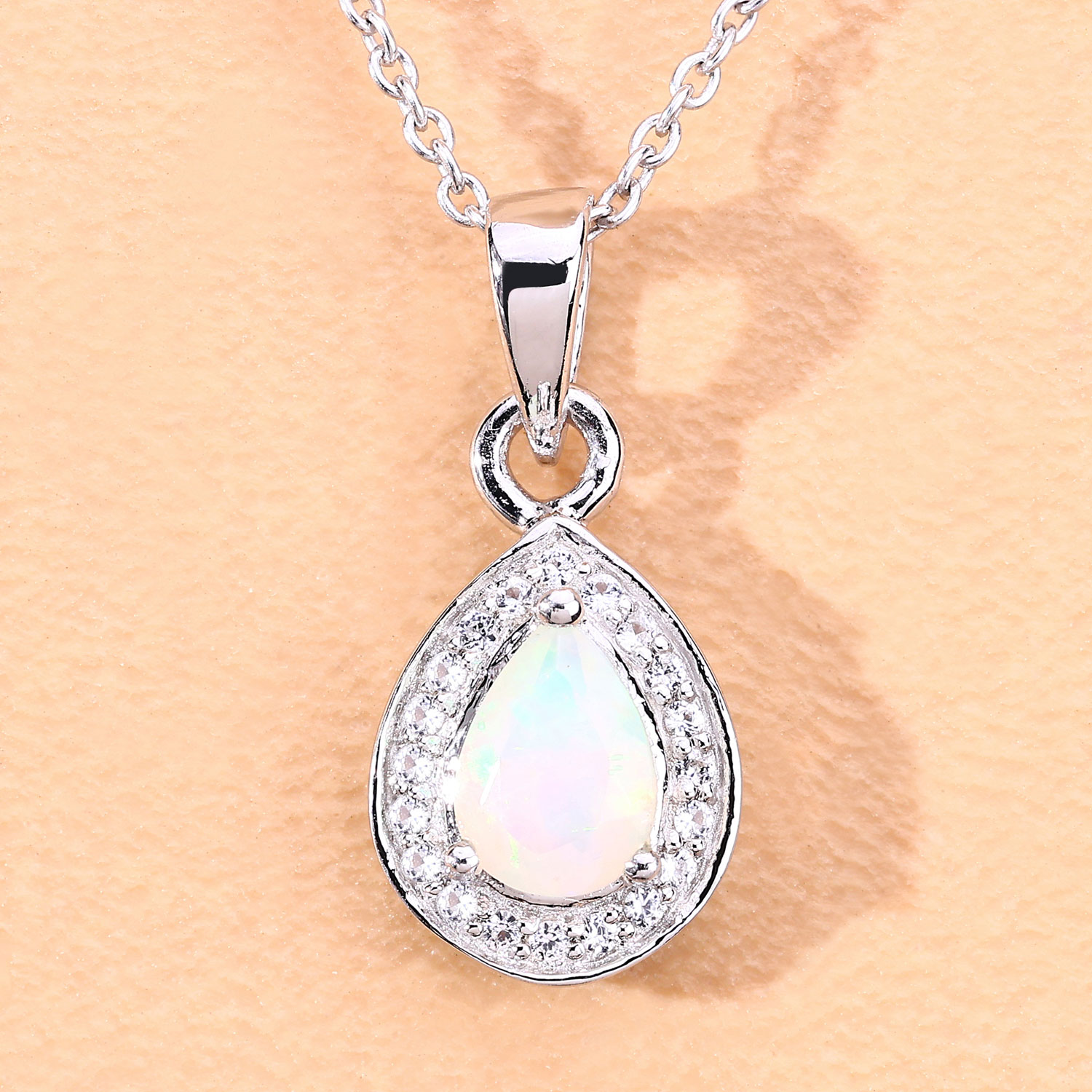 0.53 Carat Genuine Ethiopian Opal and Created White Sapphire .925 Sterling Silver Pendant