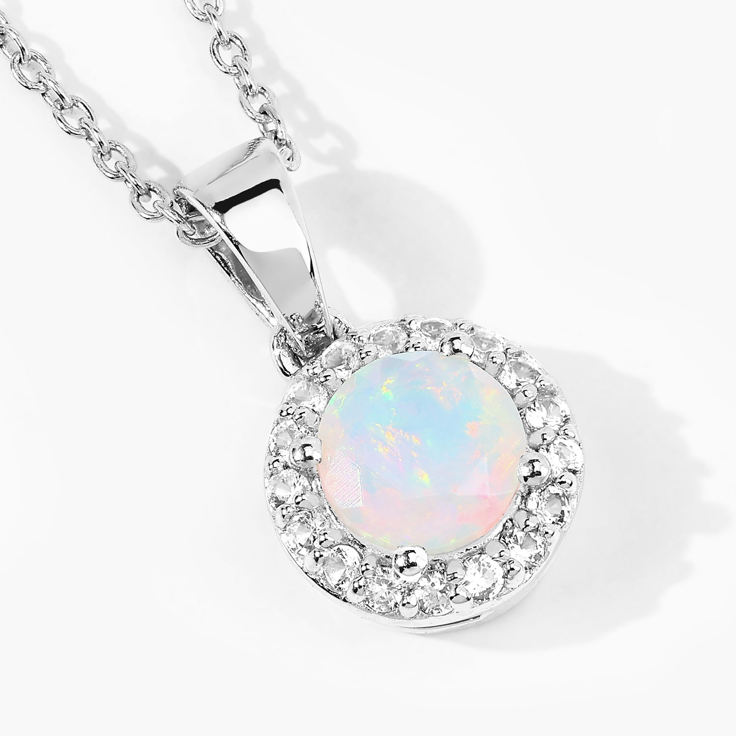 0.84 Carat Genuine Ethiopian Opal and Created White Sapphire .925 Sterling Silver Pendant