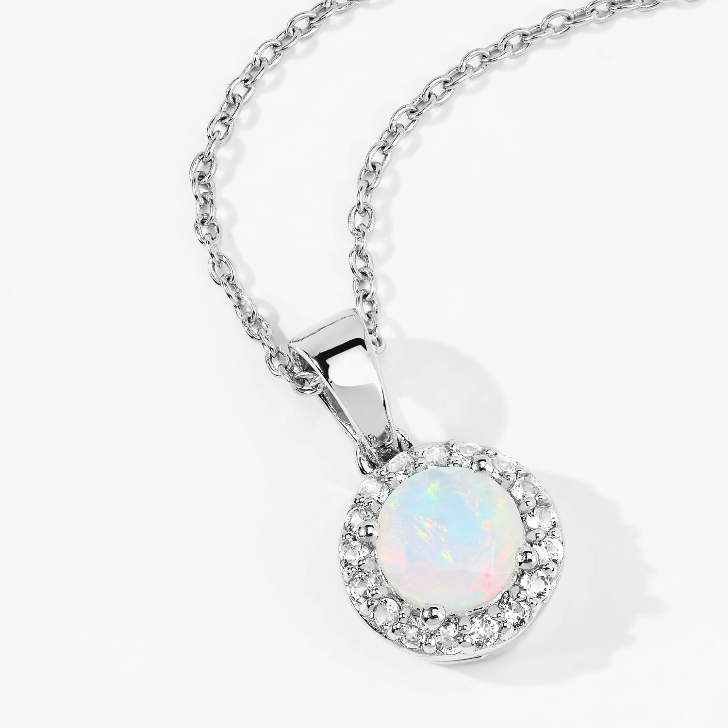 0.84 Carat Genuine Ethiopian Opal and Created White Sapphire .925 Sterling Silver Pendant