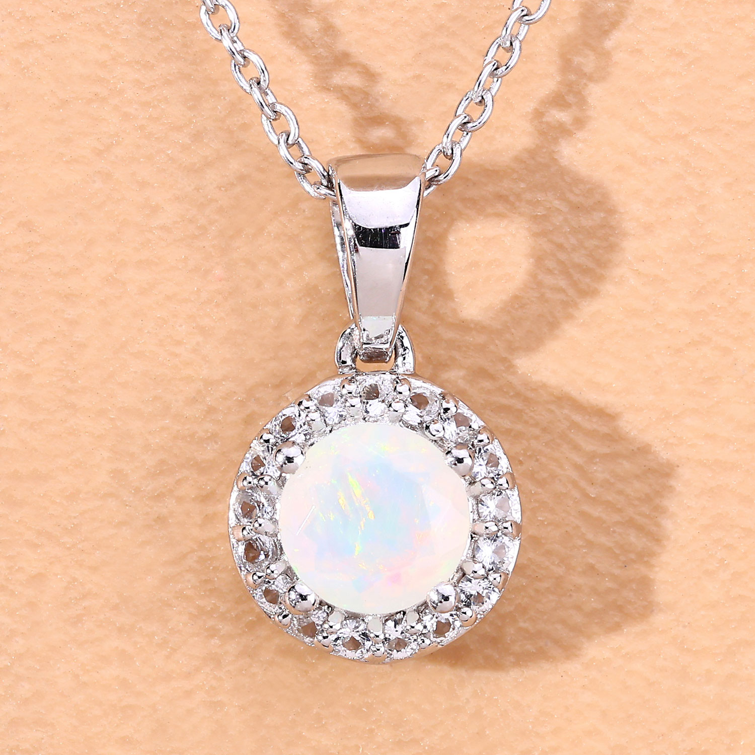 0.84 Carat Genuine Ethiopian Opal and Created White Sapphire .925 Sterling Silver Pendant