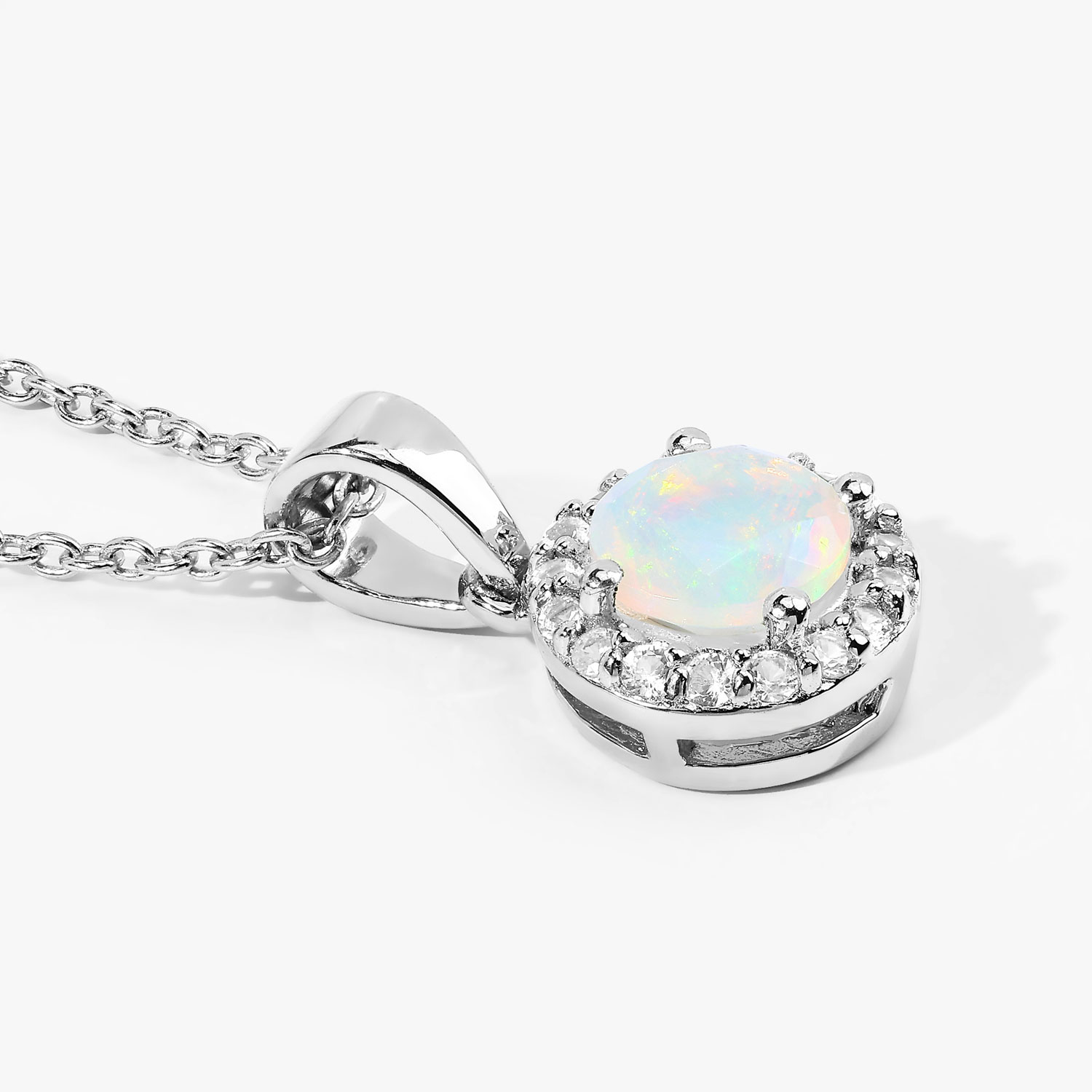 0.84 Carat Genuine Ethiopian Opal and Created White Sapphire .925 Sterling Silver Pendant