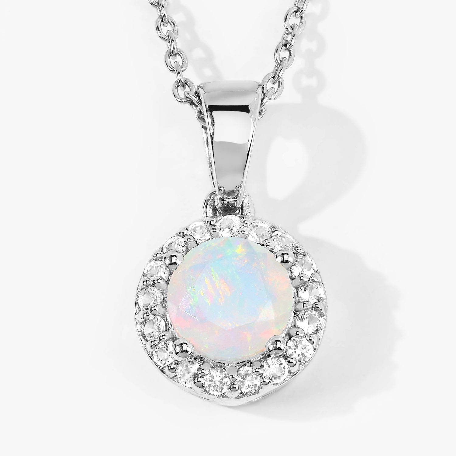 0.84 Carat Genuine Ethiopian Opal and Created White Sapphire .925 Sterling Silver Pendant