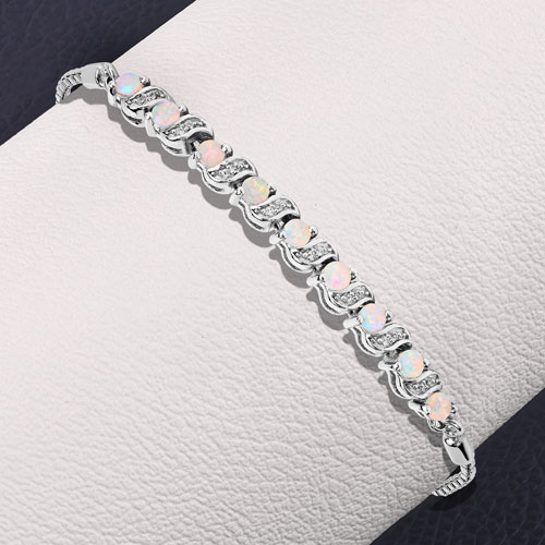 0.89 Carat Genuine Ethiopian Opal and White Topaz .925 Sterling Silver Bracelet